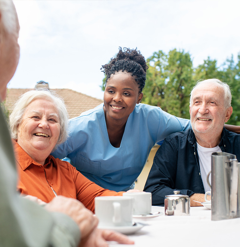 a group of people sitting at a table
